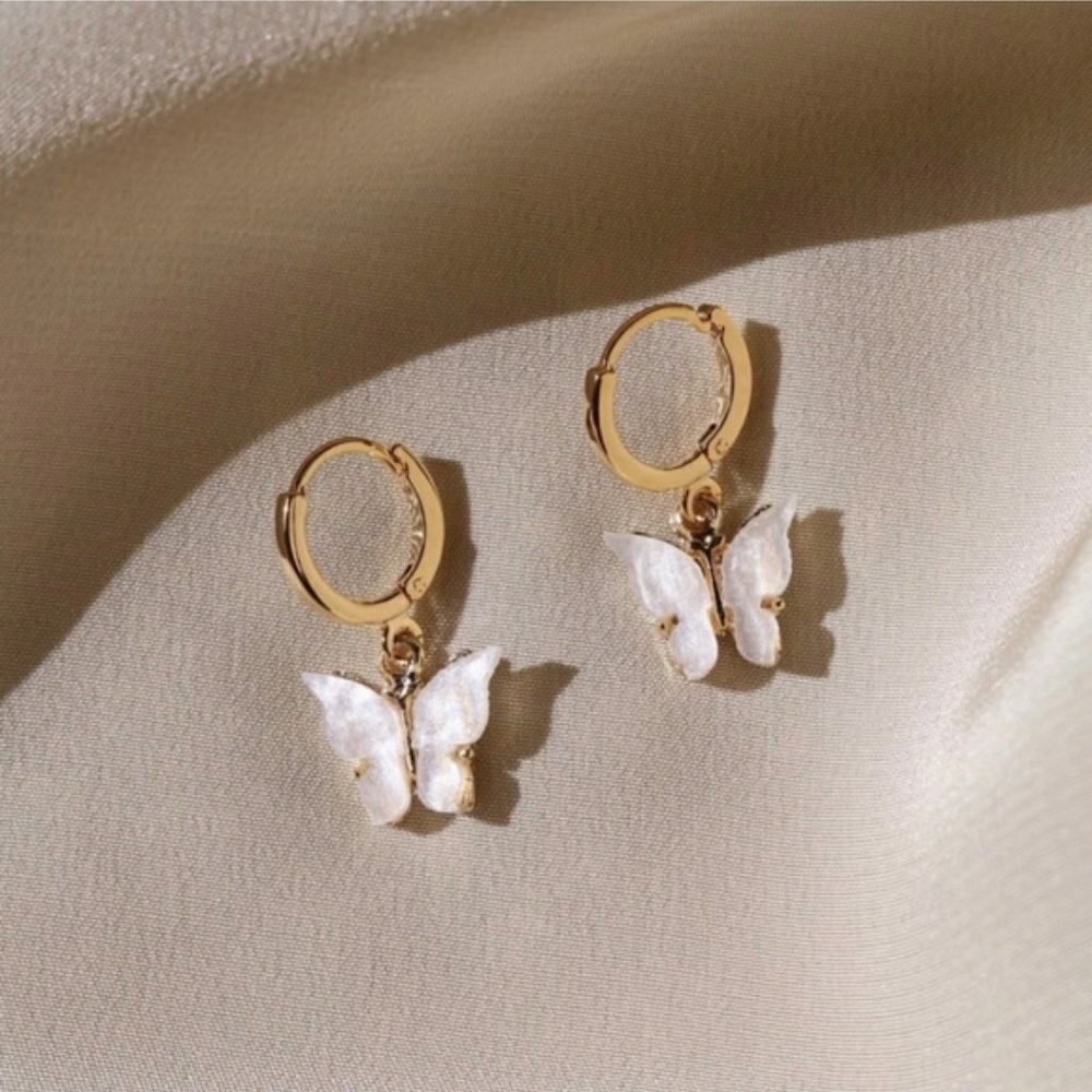 Brandy Melville White Acrylic Butterfly Earrings - Picture 2 of 3